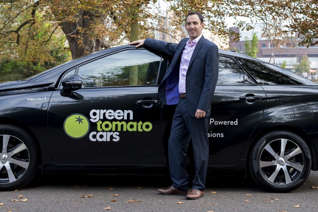 Jonny Goldstone with a hydrogen powered Toyota Mirai